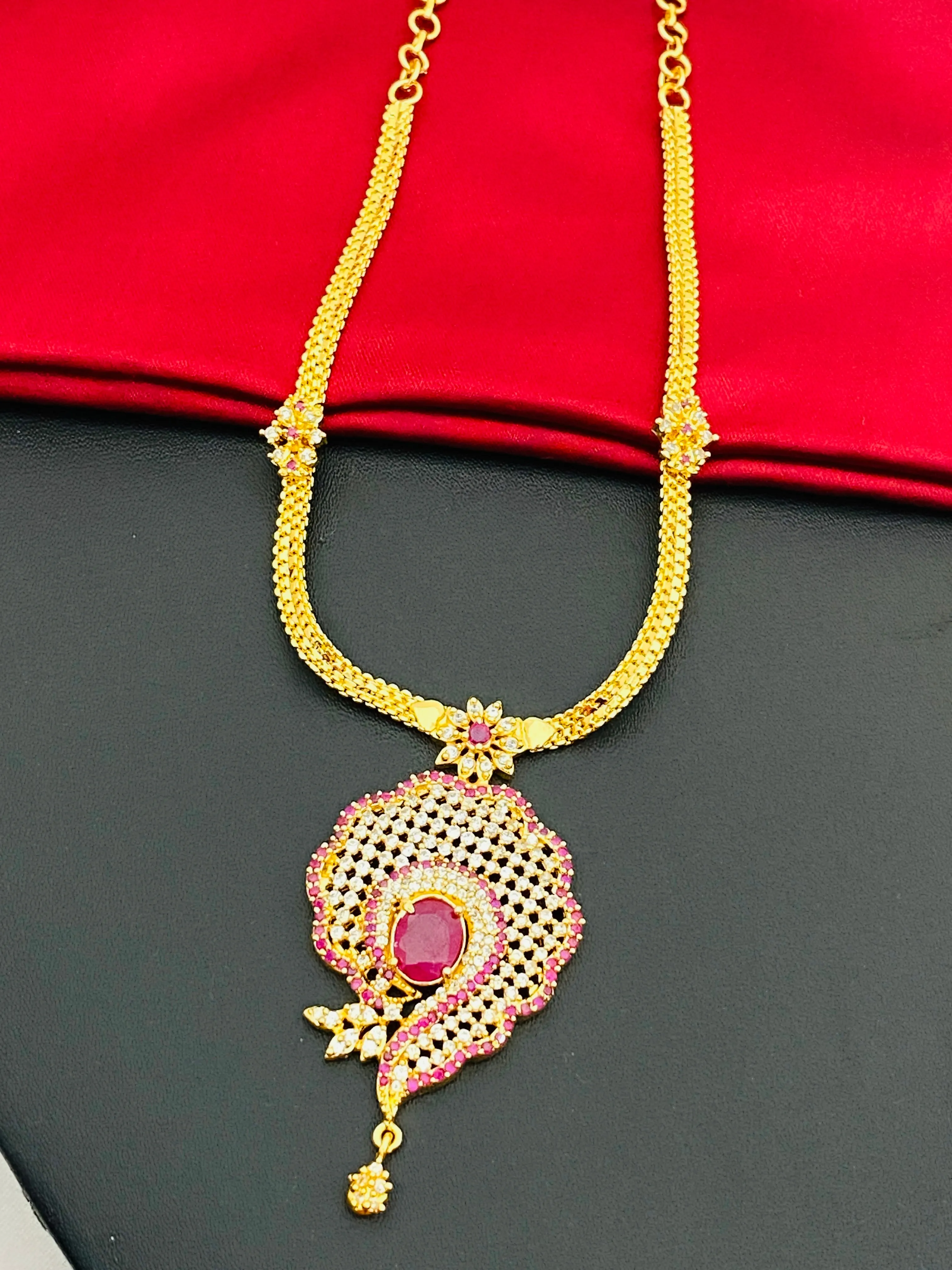 Delightful and simplistic, this beautiful necklace charms with a Sangu pendant