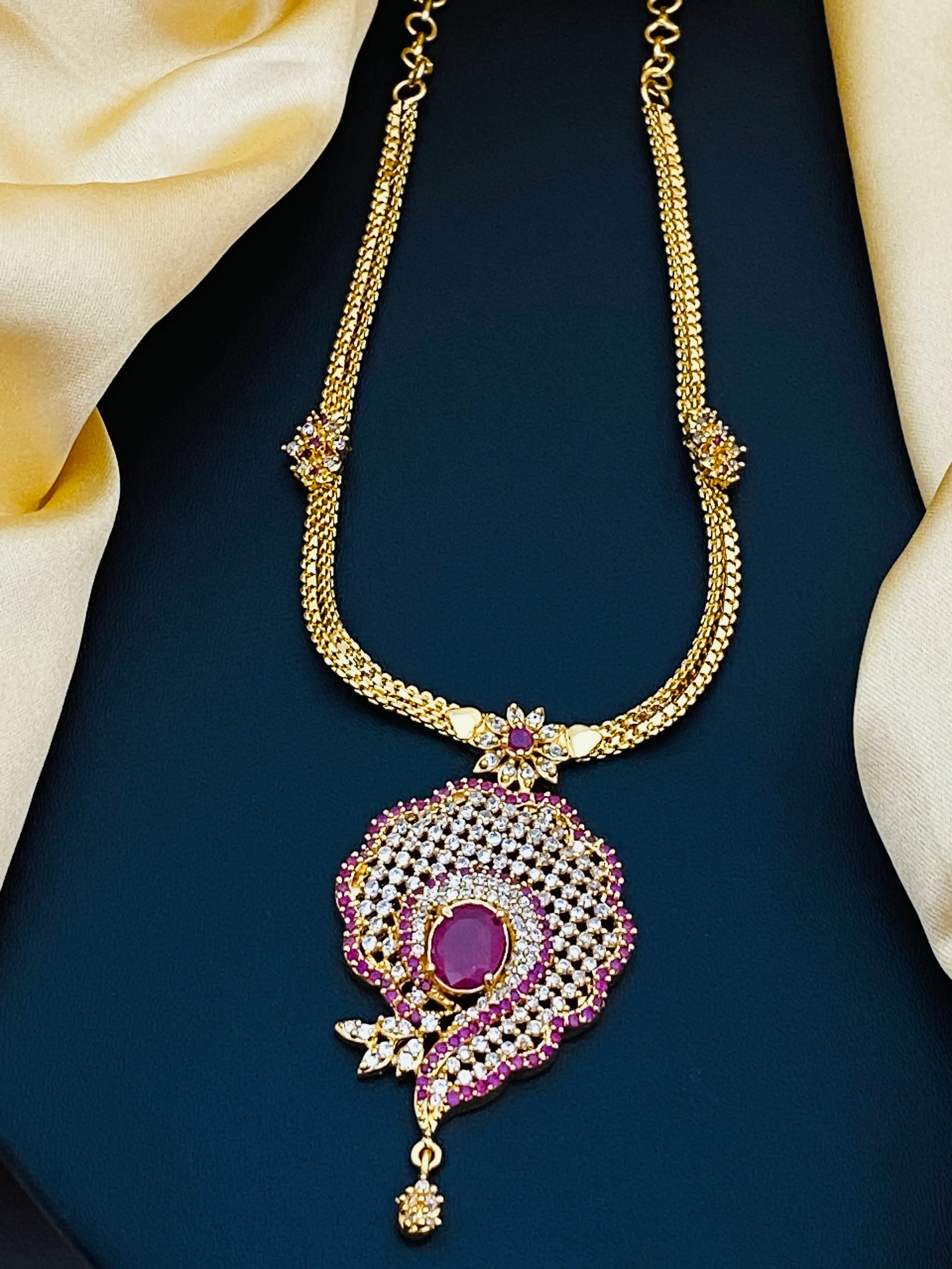 Delightful and simplistic, this beautiful necklace charms with a Sangu pendant